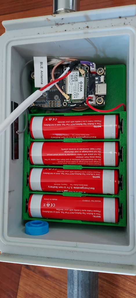 RAK4631 solar node internals — RAK board and 18650 batteries on the 3D-printed mounting board